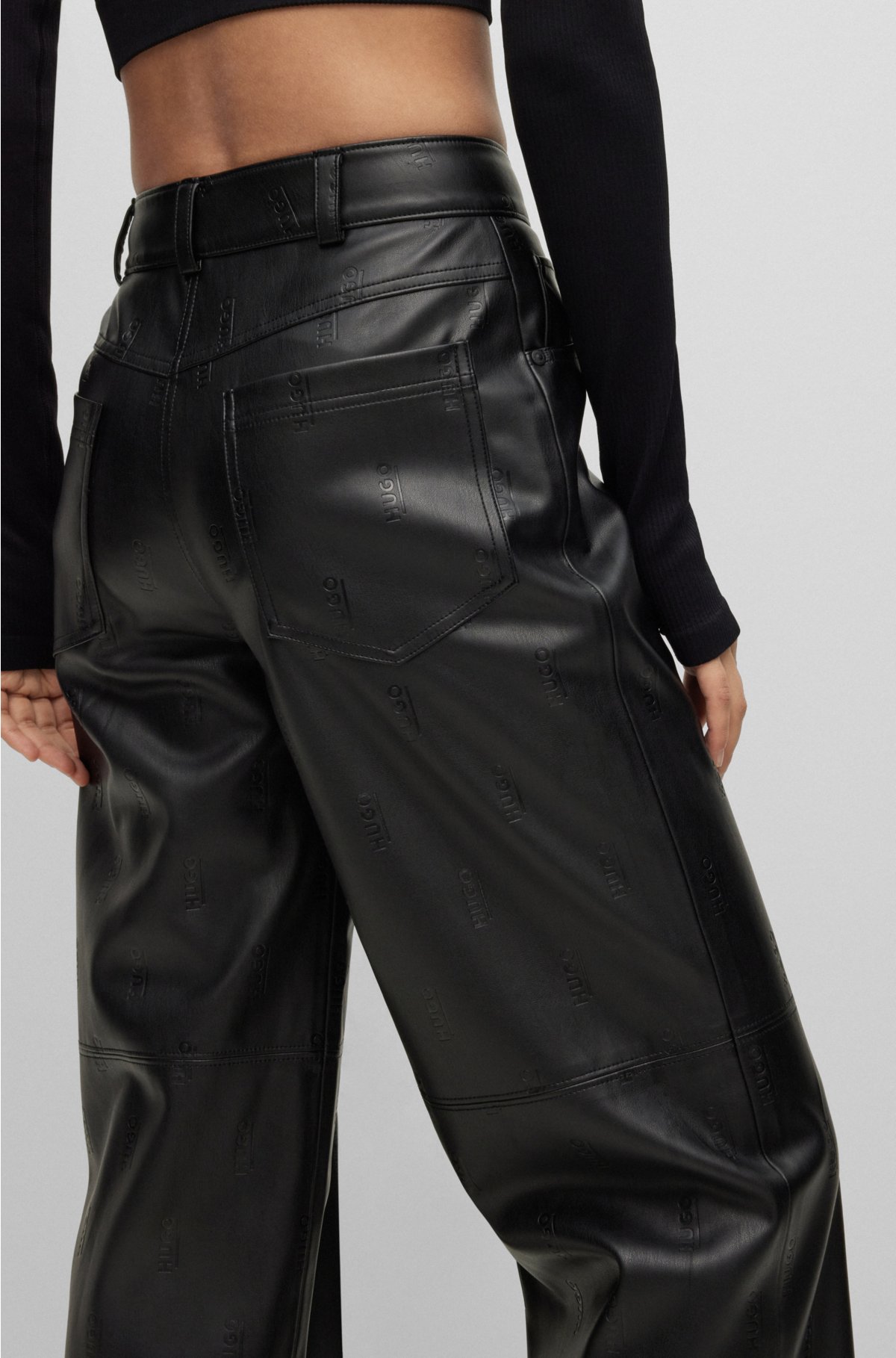 HUGO - faux Logo-embossed leather trousers in relaxed-fit