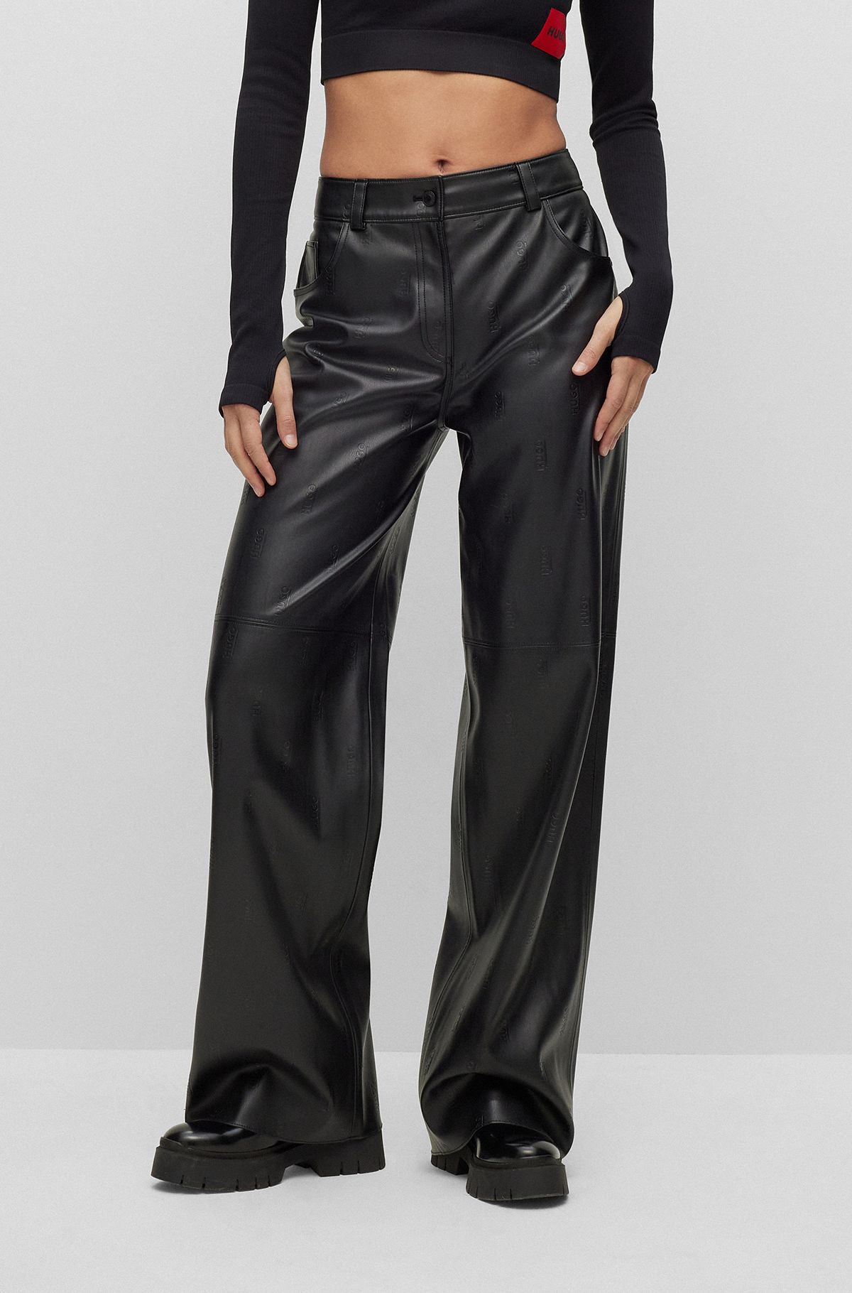 Logo-embossed relaxed-fit trousers in faux leather, Black