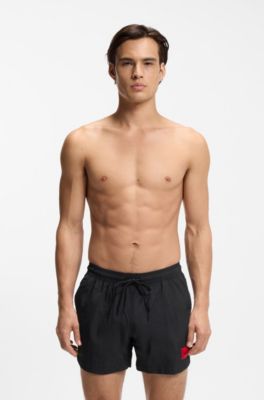 Quick-drying swim shorts with red logo label, Black