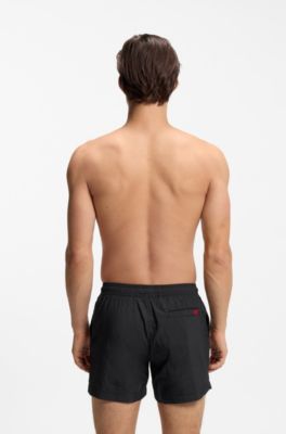 Quick-drying swim shorts with red logo label, Black