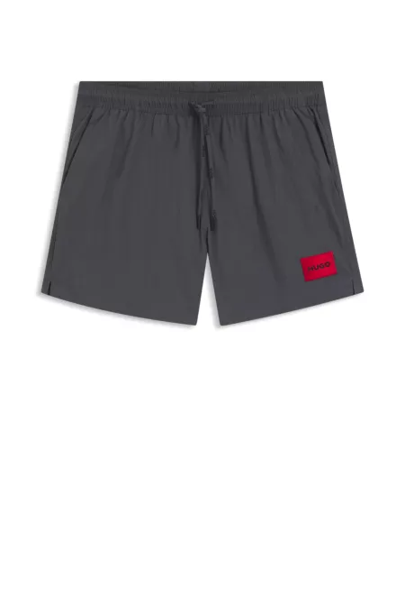 Bañador tipo shorts de secado rápido con etiqueta con logo