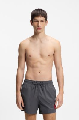Quick-drying swim shorts with red logo label, Dark Grey