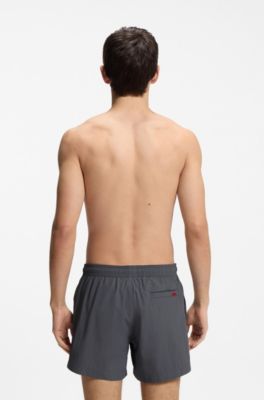 Quick-drying swim shorts with red logo label, Dark Grey