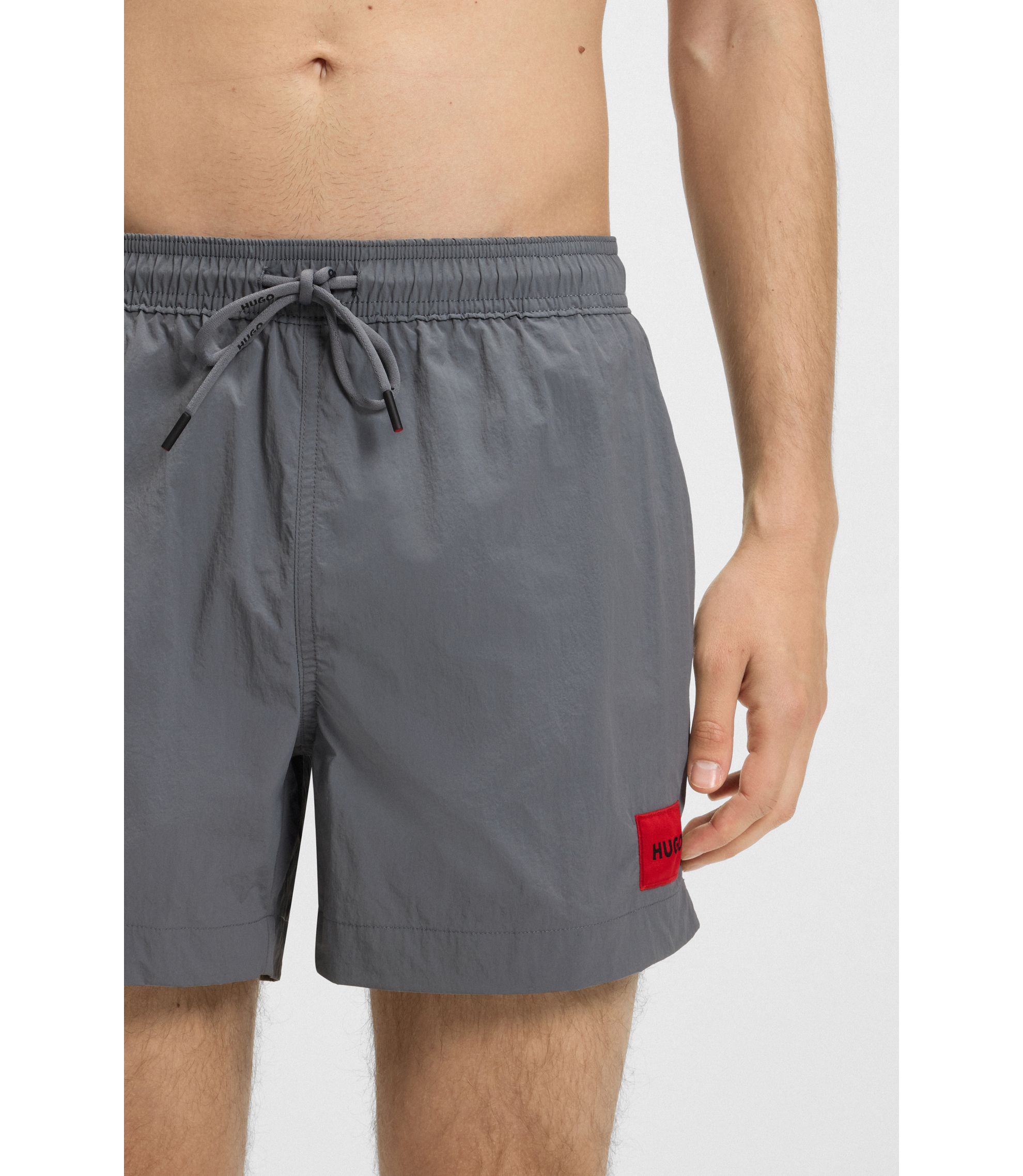 HUGO - Quick-dry swim shorts with logo label - Grey