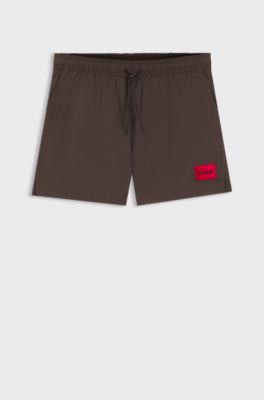 Quick-drying swim shorts with red logo label, Dark Brown