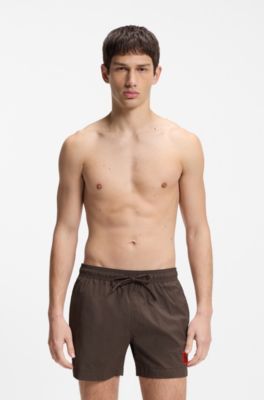 Quick-drying swim shorts with red logo label, Dark Brown
