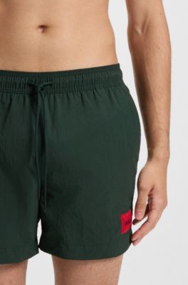 Quick-dry swim shorts with logo label, Green