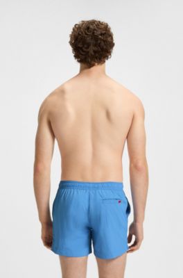Quick-dry swim shorts with logo label, Light Blue