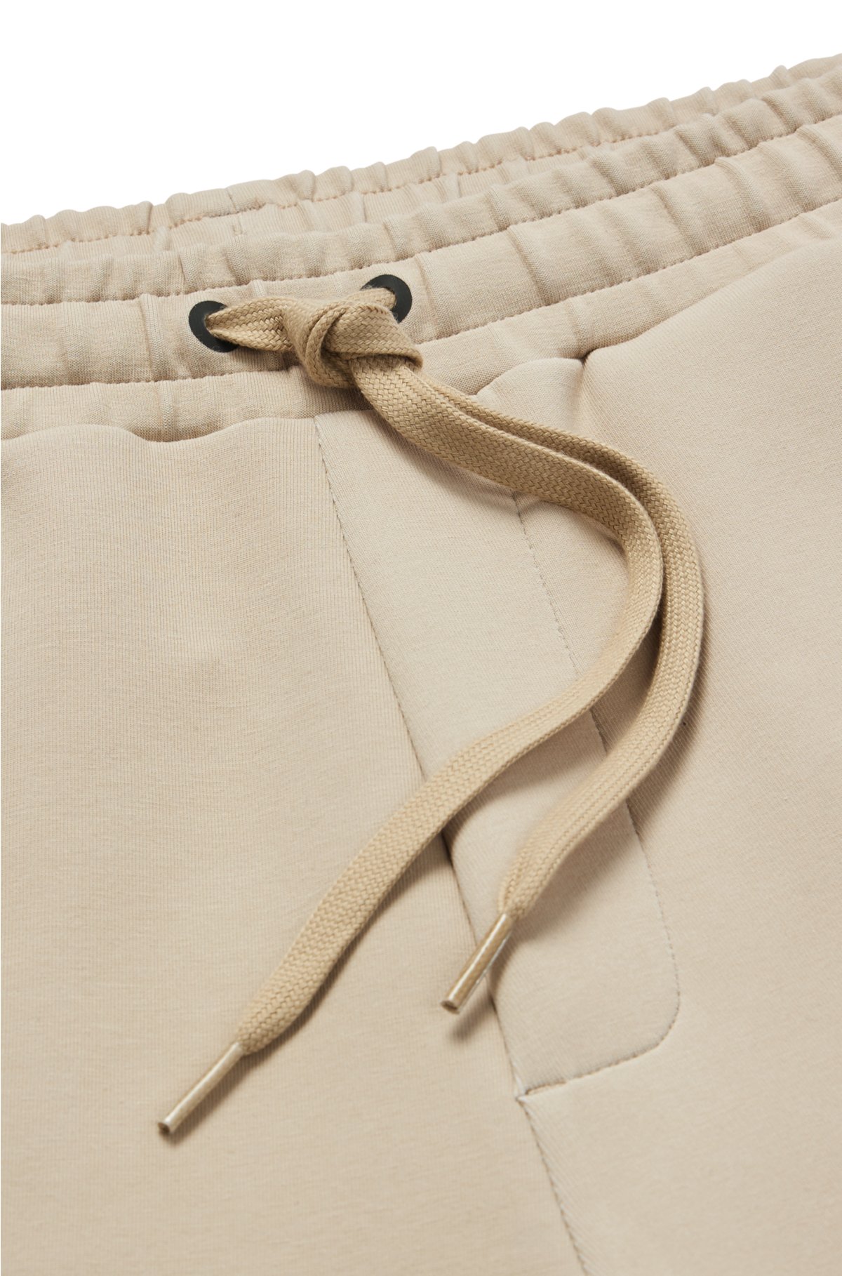 BOSS - Pantalones de chándal en mezcla de algodón elástico técnico con  bolsillos de cremallera