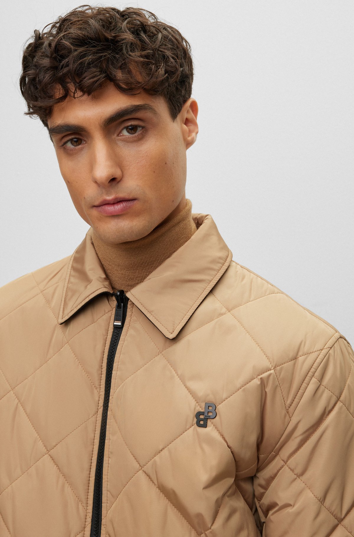 Water-repellent reversible quilted jacket with monogram trim, Beige