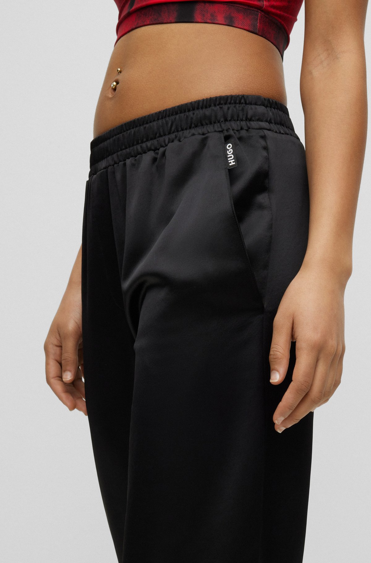 Relaxed-fit trousers in soft satin with cuff, Black