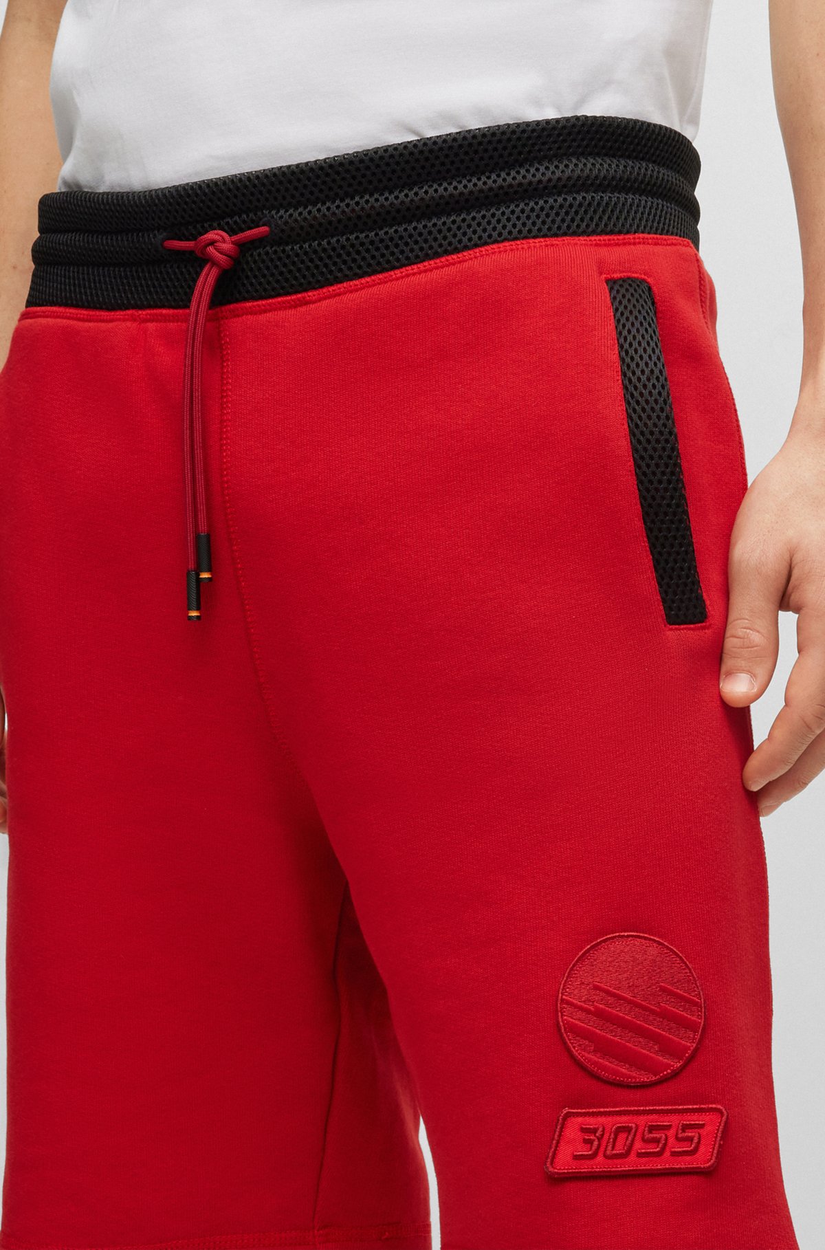 Relaxed-fit cotton shorts with racing-inspired badges, Red