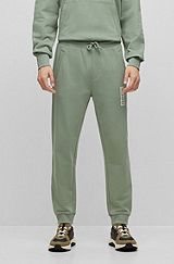 Cotton-terry tracksuit bottoms with vertical logo, Light Green