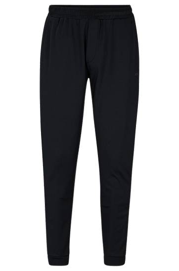 Cuffed tracksuit bottoms in active-stretch fabric, Hugo boss