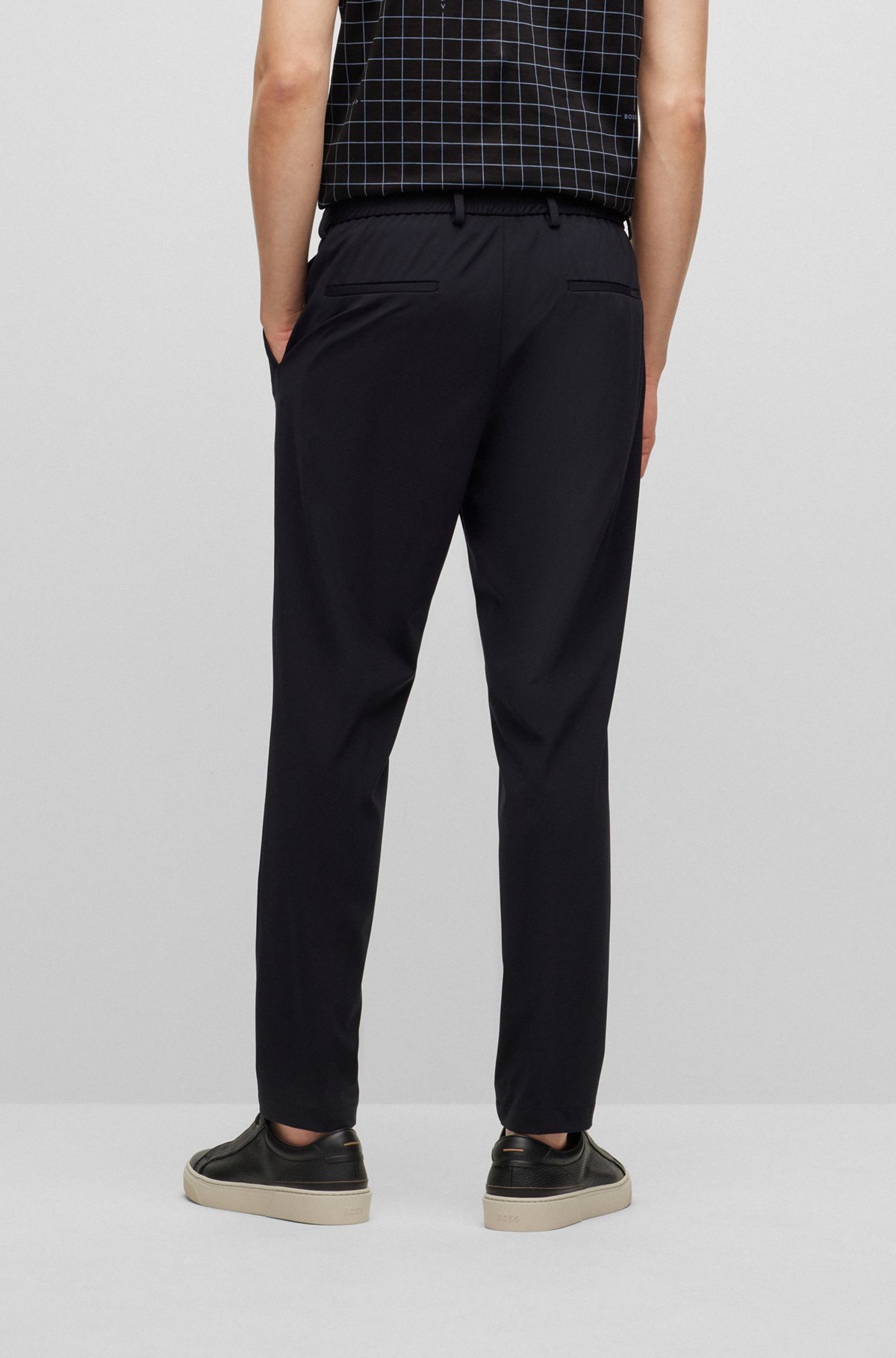 Slim-fit trousers in performance-stretch jersey, Black