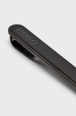 Oval-shaped tie clip with engraved logo, Black