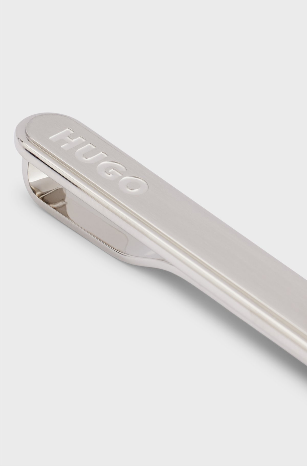 Oval-shaped tie clip with engraved logo, Silver