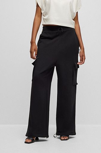 Relaxed-fit cargo-style tracksuit bottoms in cotton terry, Black