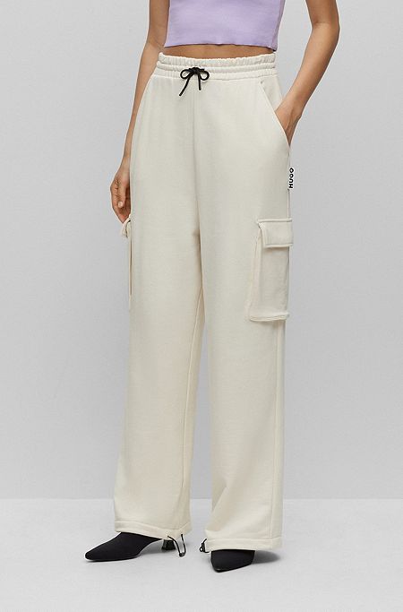 Relaxed-fit cargo-style tracksuit bottoms in cotton terry, White