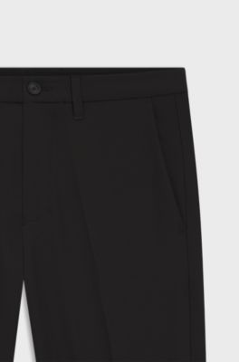 Regular-fit trousers in water-repellent stretch fabric, Black