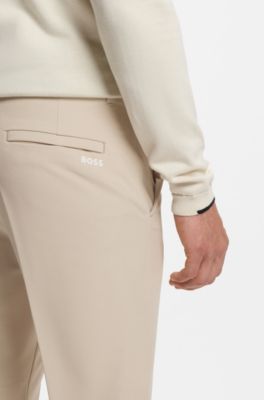 Pantalon Regular en tissu stretch d&eacute;perlant, Beige