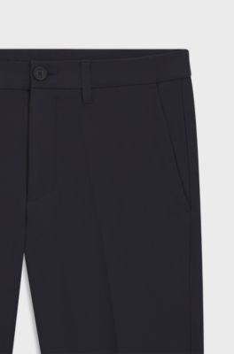 Regular fit-byxor i vattenavst&ouml;tande stretchmaterial, M&ouml;rkbl&aring;