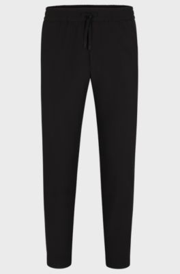 Tapered-fit chinos in easy-iron four-way stretch fabric, Black