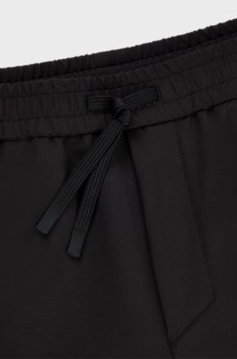 Tapered-fit chinos in easy-iron four-way stretch fabric, Black