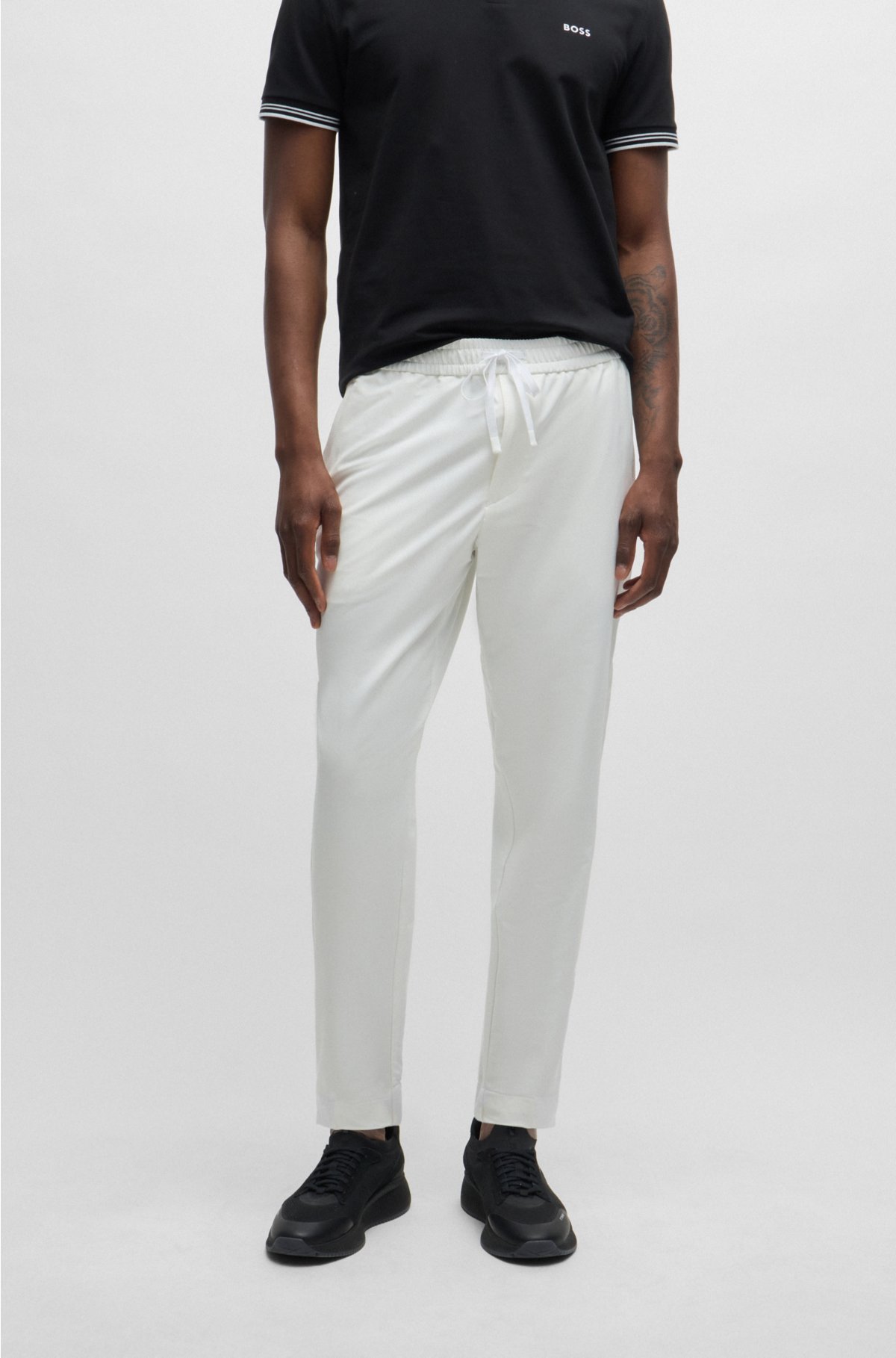 Tapered-fit chinos in easy-iron four-way stretch fabric, White