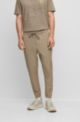 Tapered-fit chinos in easy-iron four-way stretch fabric, Light Green