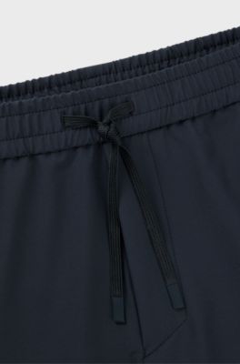 Tapered-fit chinos in easy-iron four-way stretch fabric, Dark Blue