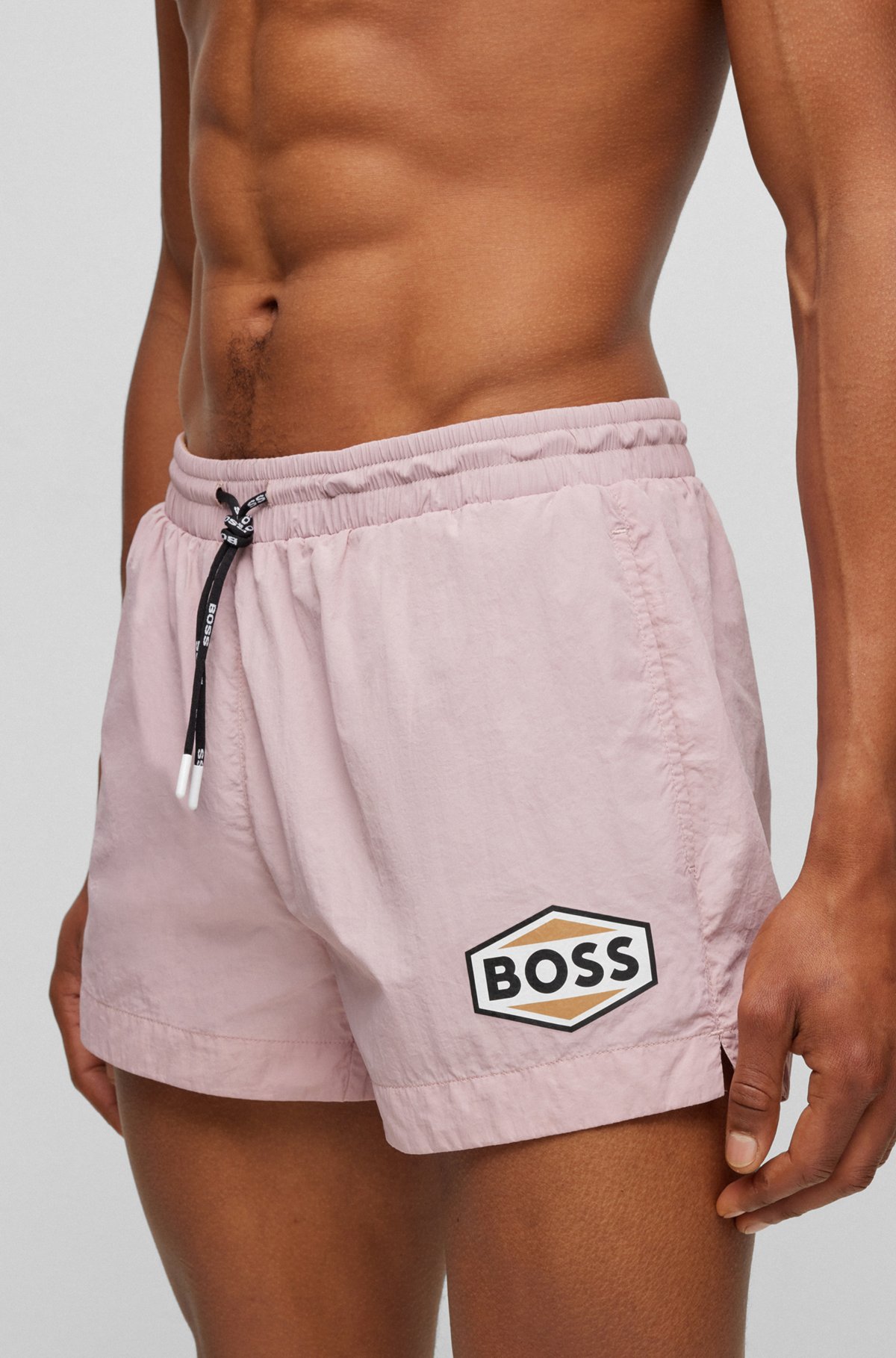 Bañador tipo shorts en tejido de secado rápido con detalles de logo, Rosa claro
