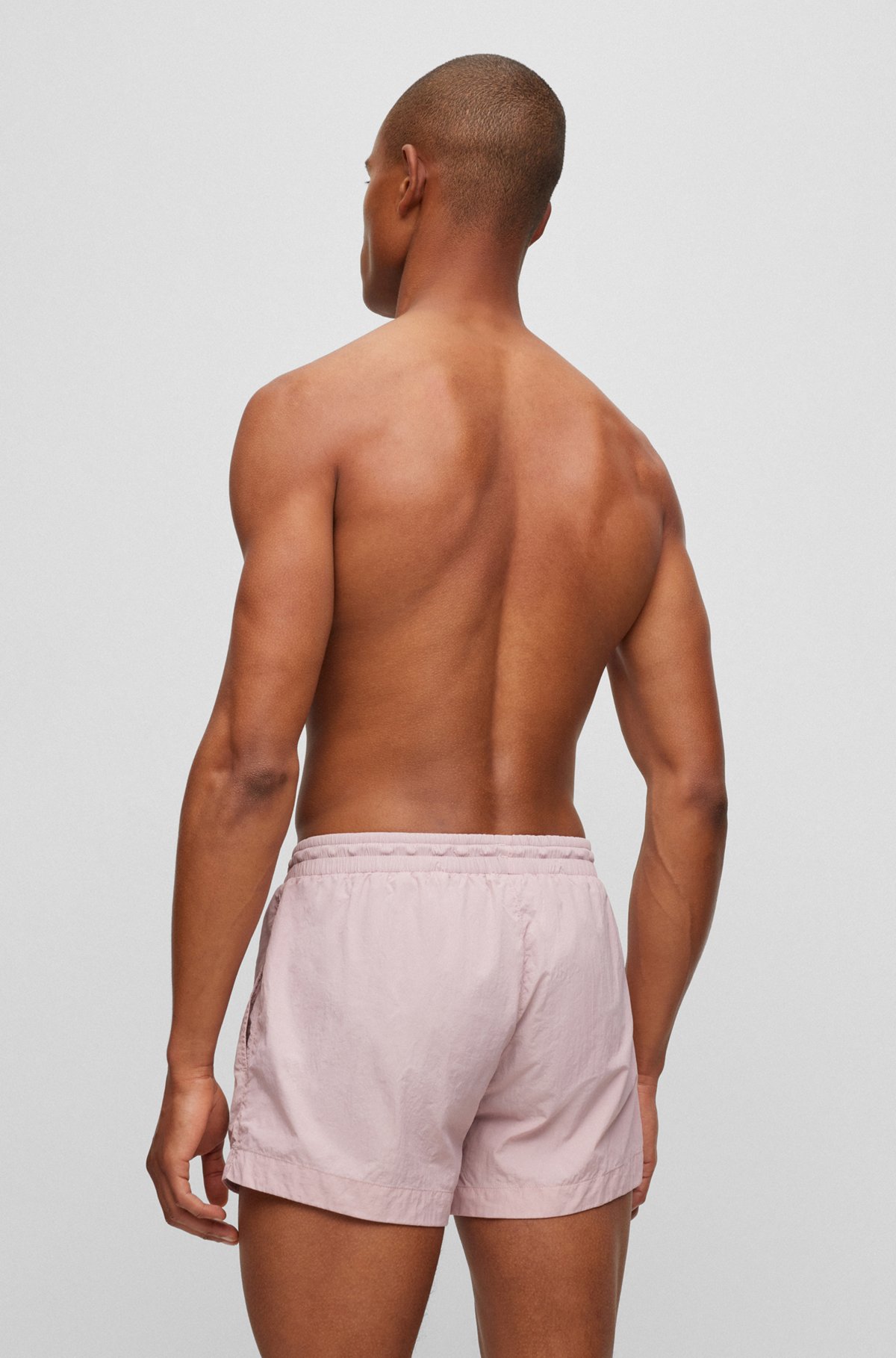 Quick-drying swim shorts with logo details, light pink