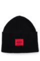 Logo-label beanie hat in a ribbed wool blend , Black