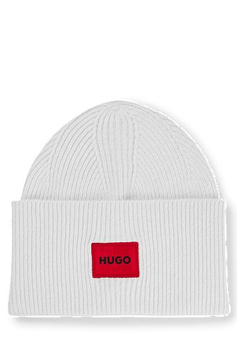 Ribbed beanie hat with red logo label, White