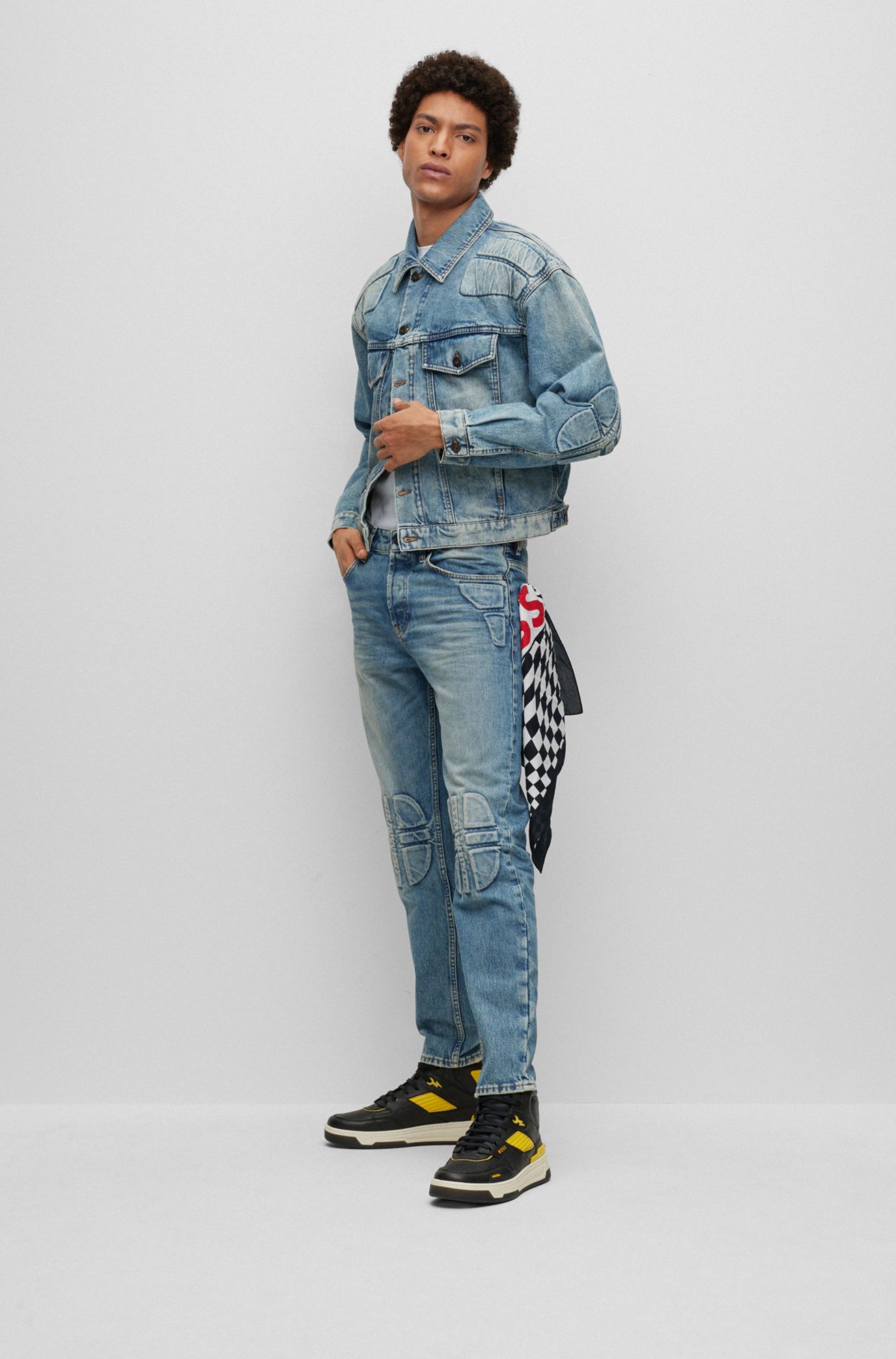 BOSS - Regular-fit biker-style jeans in mid-blue denim