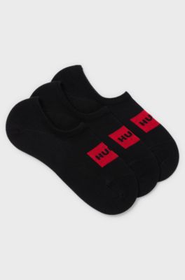 Lot de trois paires de chaussettes invisibles avec &eacute;tiquettes logo rouges, Noir