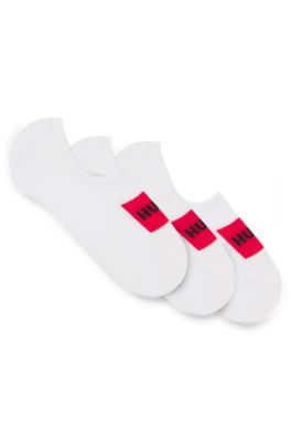 Three-pack of invisible socks with red logo labels, White