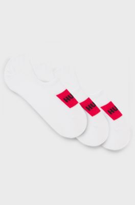 Three-pack of invisible socks with red logo labels, White