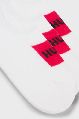 Three-pack of invisible socks with red logo labels, White