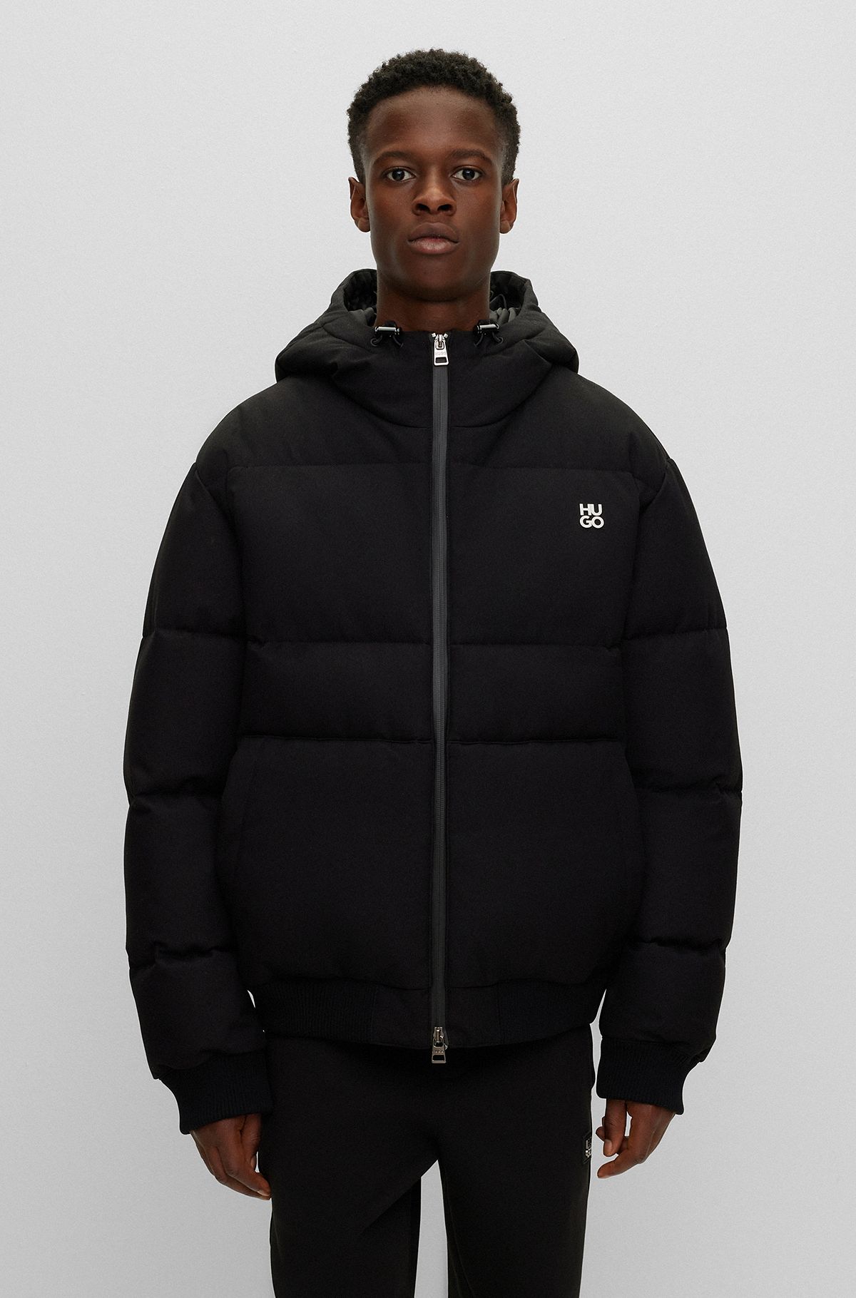 Water-repellent puffer jacket with stacked-logo trim, Black