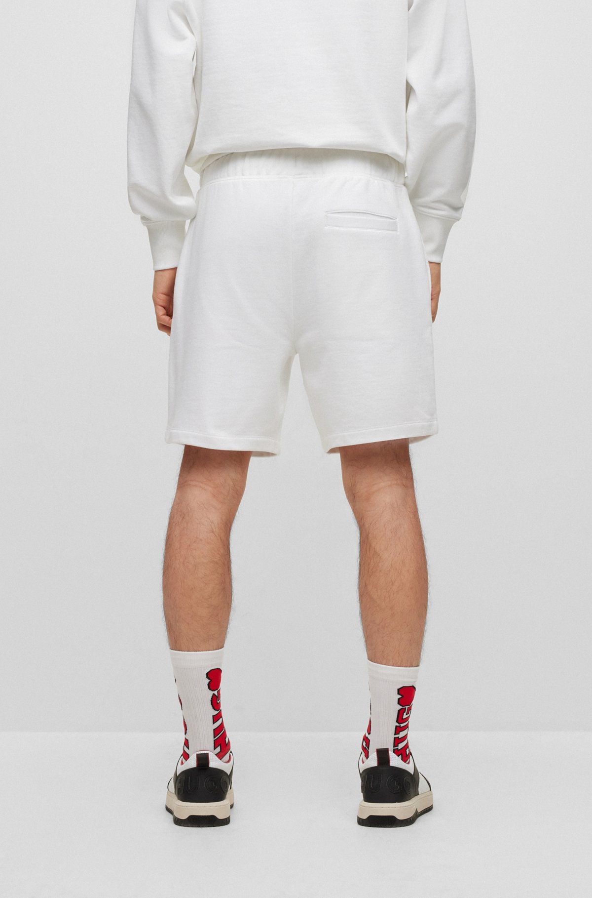 Unisex cotton-terry drawstring shorts with logo artwork, White