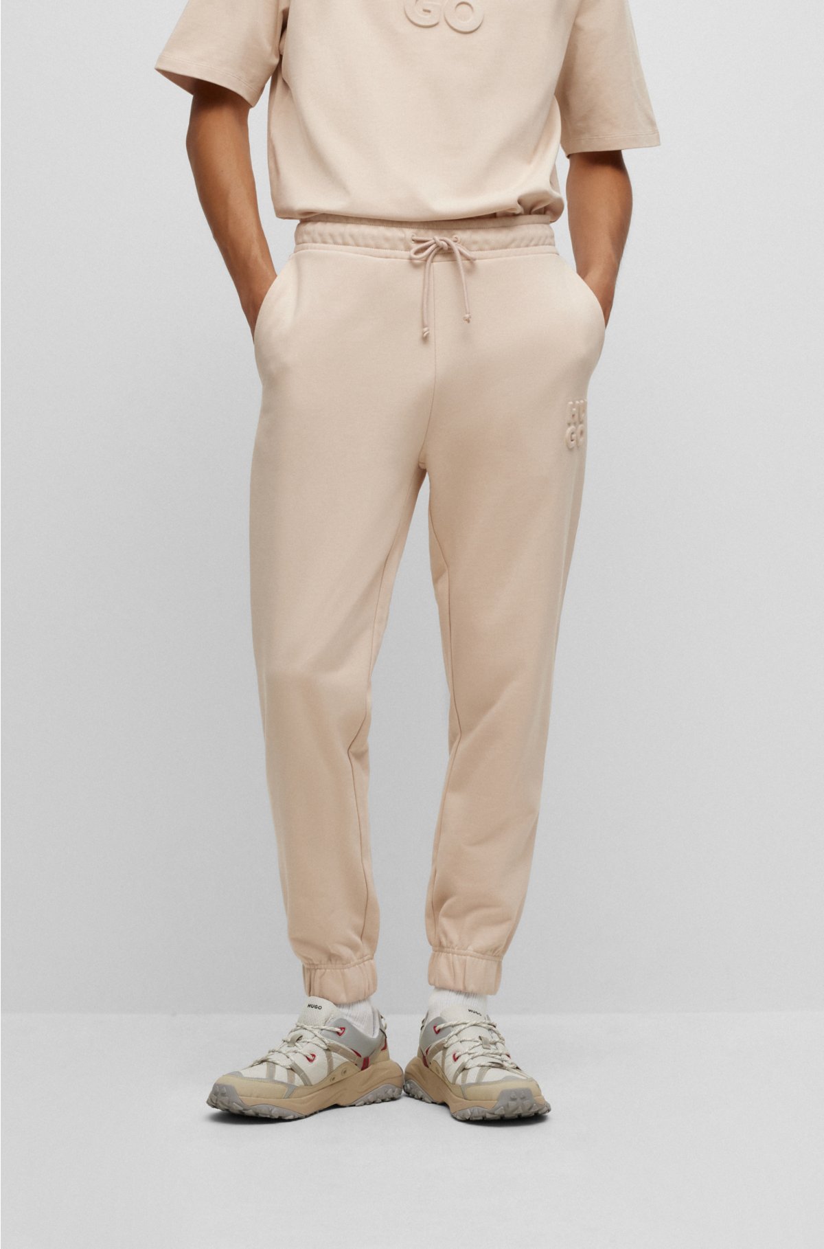 ciffer Vej Egnet HUGO - Tracksuit-bukser i bomuldsfrotté med relaxed fit og stablet logo