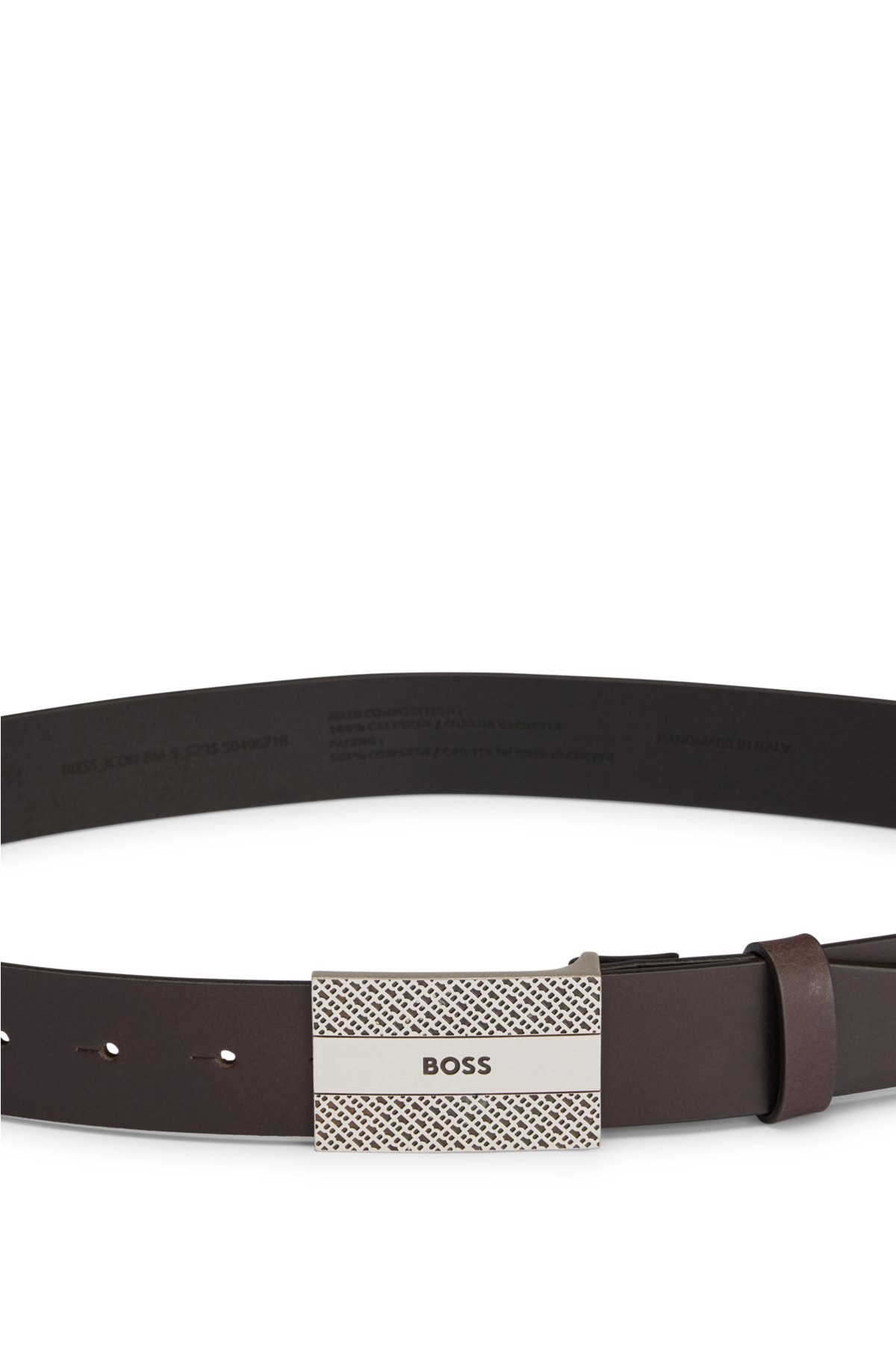 - Monogrammen der Koppelschließe auf Ledergürtel und Logo BOSS mit