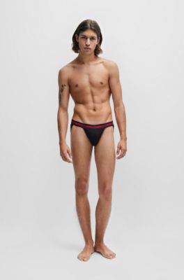 Dos de support extensible en coton recouvert d'une poche de tasse