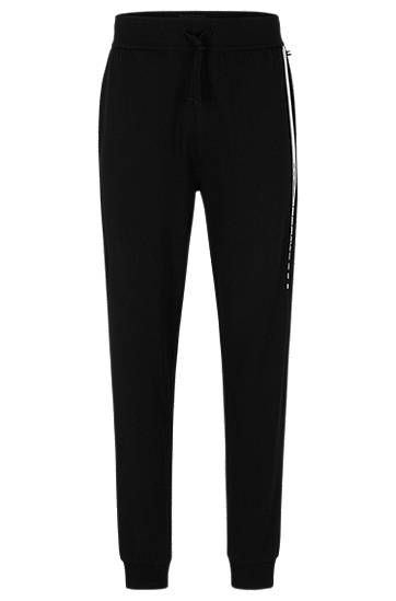 Organic-cotton tracksuit bottoms with stripes and logo, Hugo boss