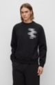Relaxed-fit sweatshirt van een katoenmix met motorsport-geïnspireerde print, Zwart