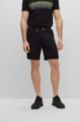 Regular-Fit Shorts mit mehrfarbigen Logos, Schwarz