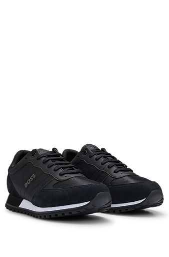 Mixed-material lace-up trainers with raised logo, Black