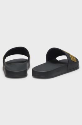 Italian-made slides with raised logo, Black